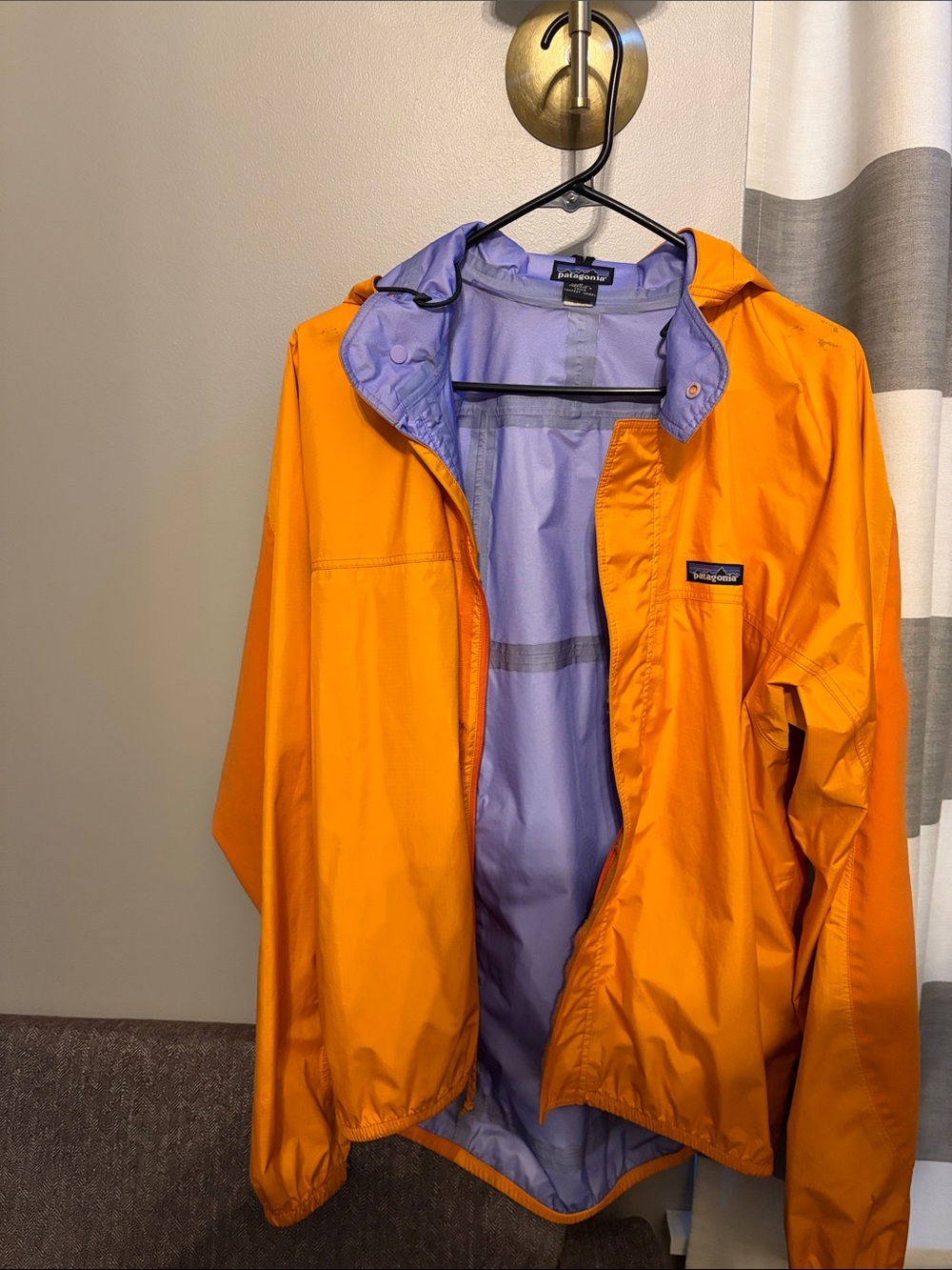 Patagonia Men’s Bright Orange Raincoat with Lavender Lining